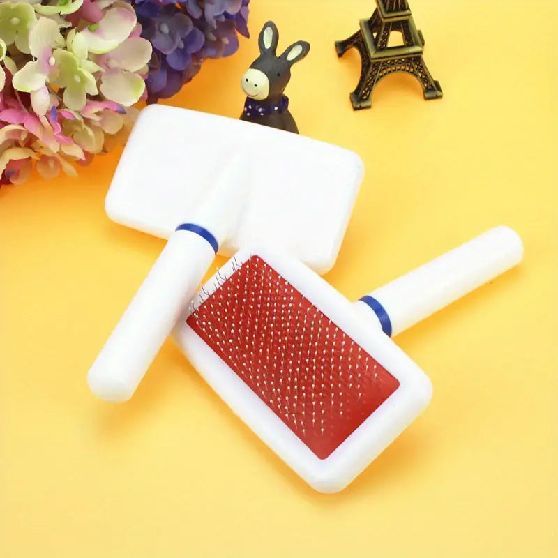Keep your pet’s fur clean and tangle-free with the Plastic White Grooming Brush for Cats &amp; Dogs. Designed for gentle yet effective grooming, this brush removes loose hair, dirt, and dander while providing a soothing massage. Perfect for all coat types, ensuring a healthy and shiny coat. Shop now at PetsGrocery.pk!